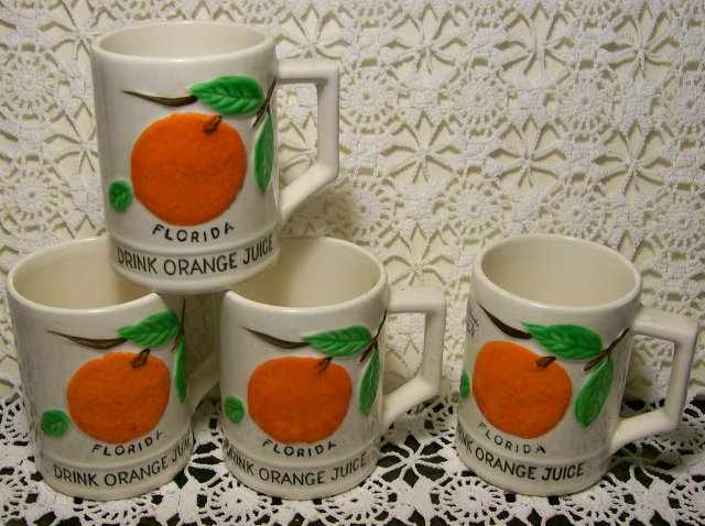 Florida Souvenir Ceramic Juice Mug Set of 4 Embossed Oranges Ca. 1950's