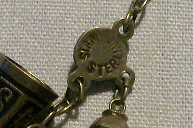 Siam Sterling Bracelet: Bells & Fans