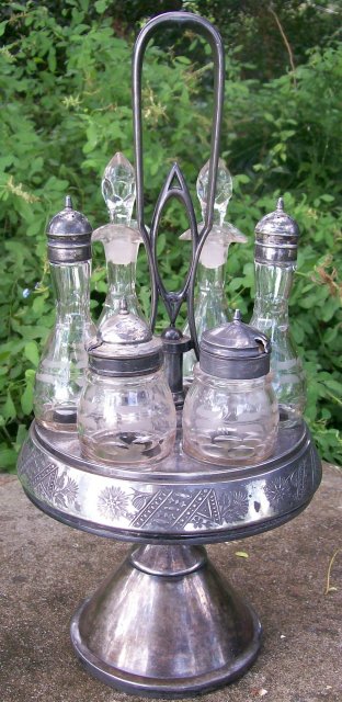 Rogers & Brothers Victorian Silver-Plate Castor Set: 6 Bottles with Holder