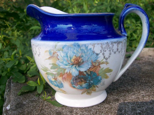 Early American Dinnerware Ceramic Cobalt-trimmed Jug with Floral Decal
