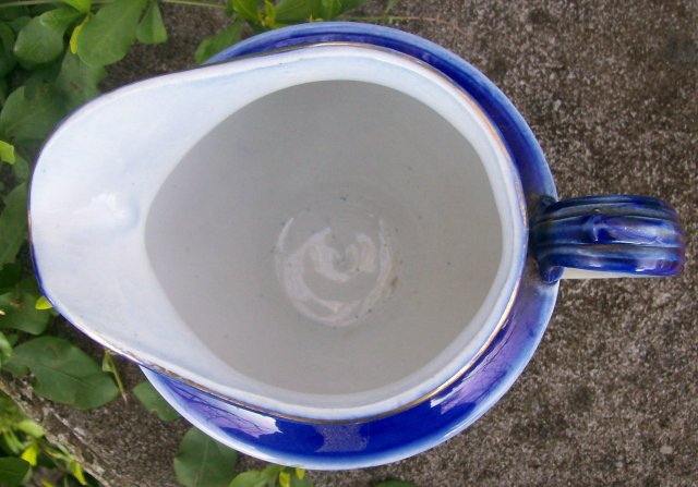 Early American Dinnerware Ceramic Cobalt-trimmed Jug with Floral Decal