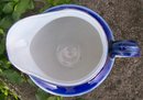 Early American Dinnerware Ceramic Cobalt-trimmed Jug with Floral Decal