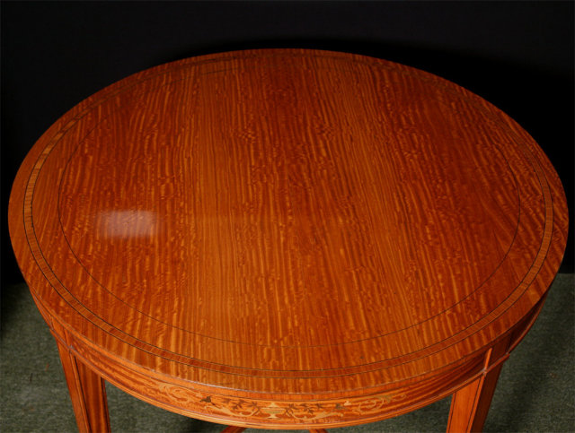 A Small Satinwood Center Table