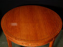 A Small Satinwood Center Table
