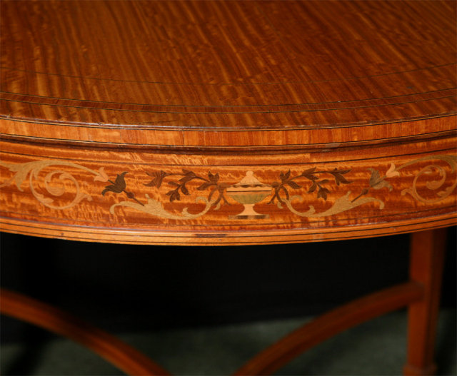 A Small Satinwood Center Table
