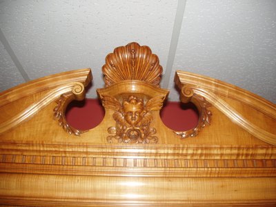 An excellent quality English 19th century Armoire in Satinwood with finely detailed carving.