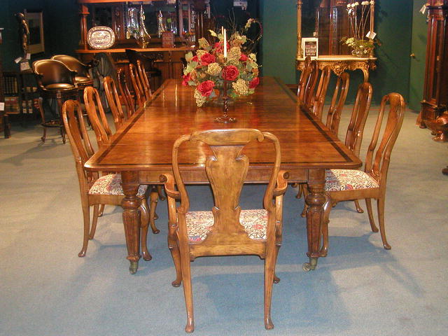 A fine and rare set of 12 English Burr Walnut Queen Anne Dining Chairs .The set comprises of 10 Side Chairs and 2 armchairs