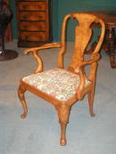 A fine and rare set of 12 English Burr Walnut Queen Anne Dining Chairs .The set comprises of 10 Side Chairs and 2 armchairs