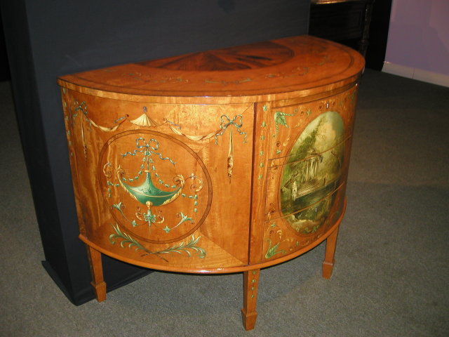 A Fine Quality English Demi Lune Painted satinwood Commode / Chest