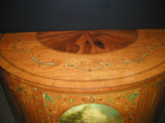 A Fine Quality English Demi Lune Painted satinwood Commode / Chest