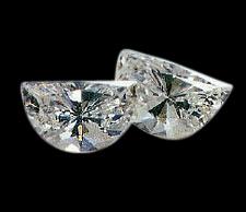 0.50 carat pair of half moon diamonds F VS1 half-moon
