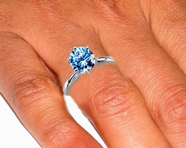 Gorgeous round blue diamond solitaire ring 1.25 carats