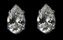 F VS1 diamonds pear cut stud post earrings 2.02 ct.