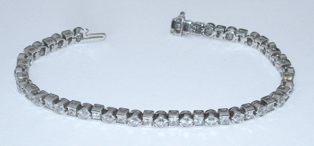6.5 carats diamond tennis bracelet princess round bezel