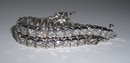 14 carat DIAMOND TENNIS BRACELET VS bezel style setting