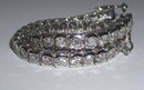 14 carat DIAMOND TENNIS BRACELET VS bezel style setting