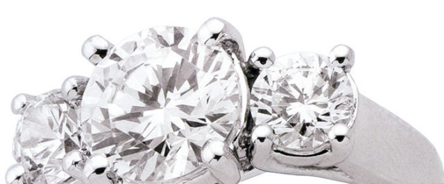 3.01 CARAT three stone diamond ring PLATINUM F/G VS1