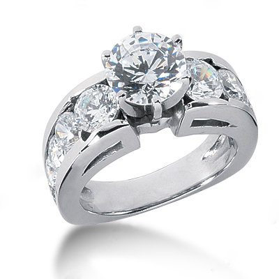 F VS1 diamonds 4.25 cts. Engagement ring with accents