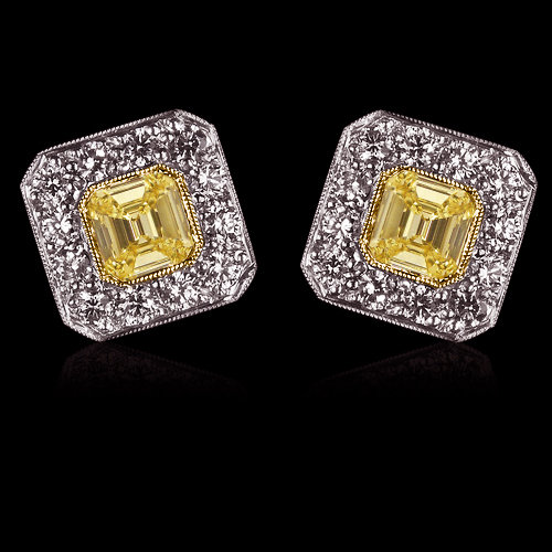 2 ct. fancy yellow diamonds stud earrings emerald cut