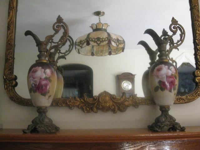 matched pair of hand painted roses ewers