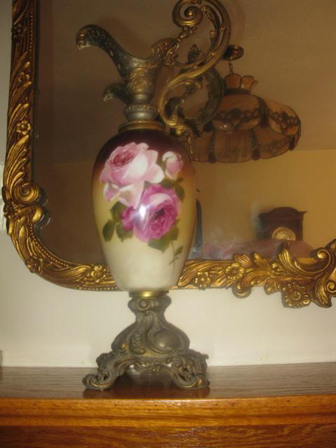 matched pair of hand painted roses ewers
