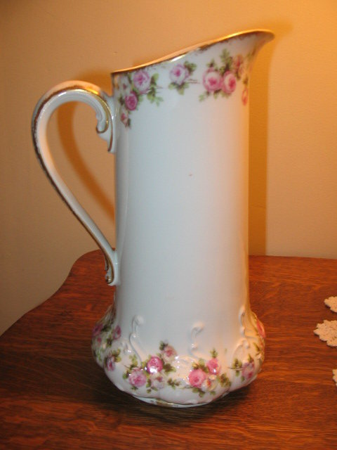 LARGE LIMOGES PITCHER WITH PINK ROSES