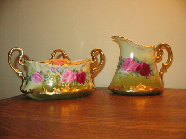 LIMOGES FAMOUS ARTIST PAINTED CREAM AND SUGAR