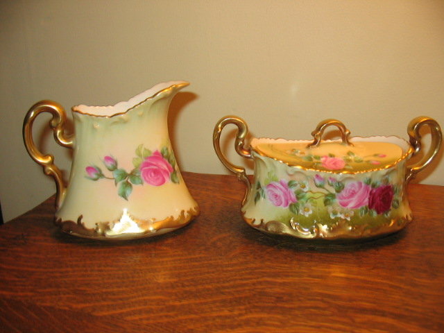 LIMOGES FAMOUS ARTIST PAINTED CREAM AND SUGAR