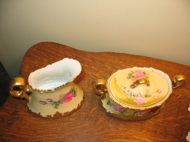 LIMOGES FAMOUS ARTIST PAINTED CREAM AND SUGAR