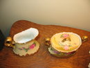 LIMOGES FAMOUS ARTIST PAINTED CREAM AND SUGAR