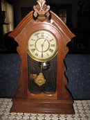 early antique walnut ansonia clock