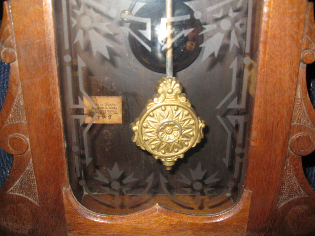 early antique walnut ansonia clock
