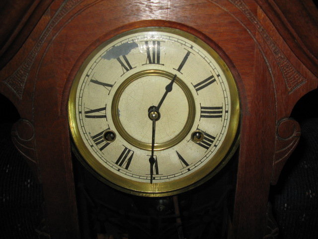 early antique walnut ansonia clock