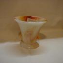 Akro Agate orange and white vase with embossed flowers