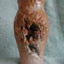 Terra Cotta vase, brown/gray with inset carving