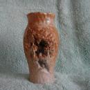 Terra Cotta vase, brown/gray with inset carving