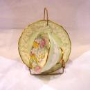 Green flowered cup and saucer