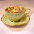 Green flowered cup and saucer