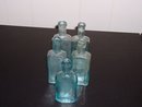 Group of 5 Antique Aqua rectangular bottles