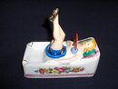 GIRL NODDER ASHTRAY