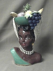 Island Lady with basket of fruit on her head