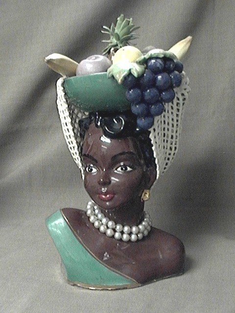 Island Lady with basket of fruit on her head