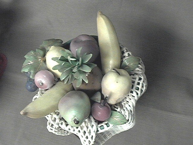 Island Lady with basket of fruit on her head