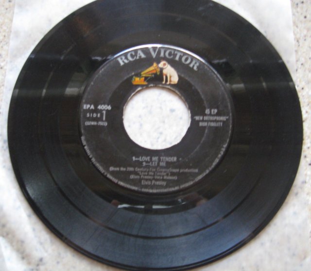 Elvis Presley Double 45 Record: Side 1, Love Me Tender-Let Me 2, Poor Boy-We're Gonna Move