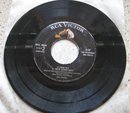 Elvis Presley Double 45 Record: Side 1, Love Me Tender-Let Me 2, Poor Boy-We're Gonna Move