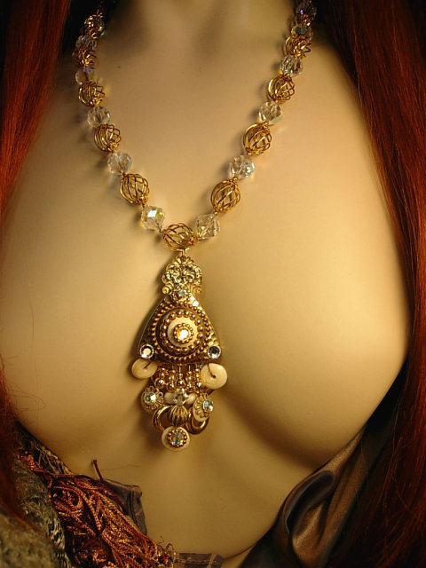 Gorgeous Gypsy necklace Aurora borealis Crystal with golden cages and dramatic tassel pendant