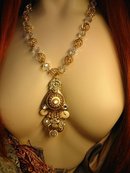 Gorgeous Gypsy necklace Aurora borealis Crystal with golden cages and dramatic tassel pendant