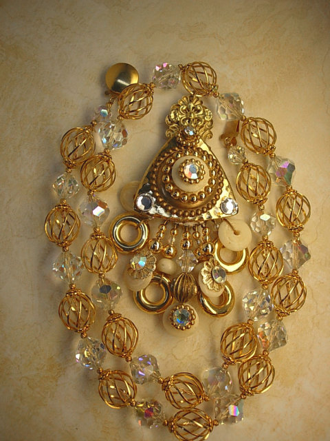 Gorgeous Gypsy necklace Aurora borealis Crystal with golden cages and dramatic tassel pendant