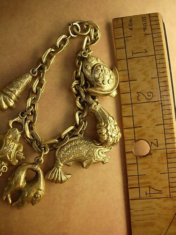 Victorian Charm bracelet Bizarre Unusual Charms Asian renaissance medieval