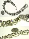 Dazzling signed Lisner smokey topaz glass and aurora borealis bracelet